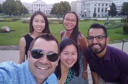 Fellows taking a selfie on campus